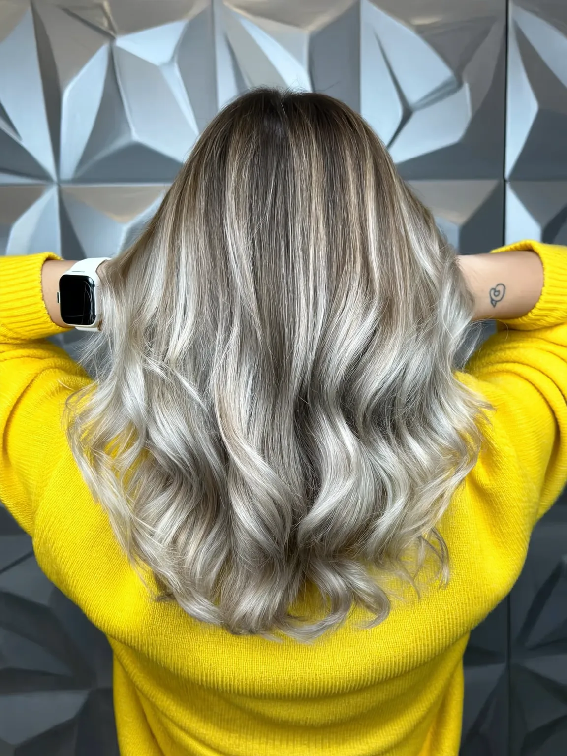 Medium-Length Voluminous Ash Blonde Layers with Soft Highlights